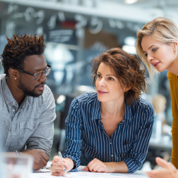 Board members gathered around a table